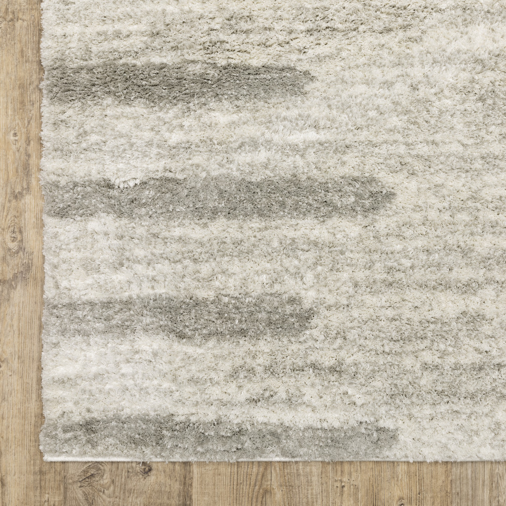8" X 11" Gray and Ivory Geometric Shag Power Loom Area Rug