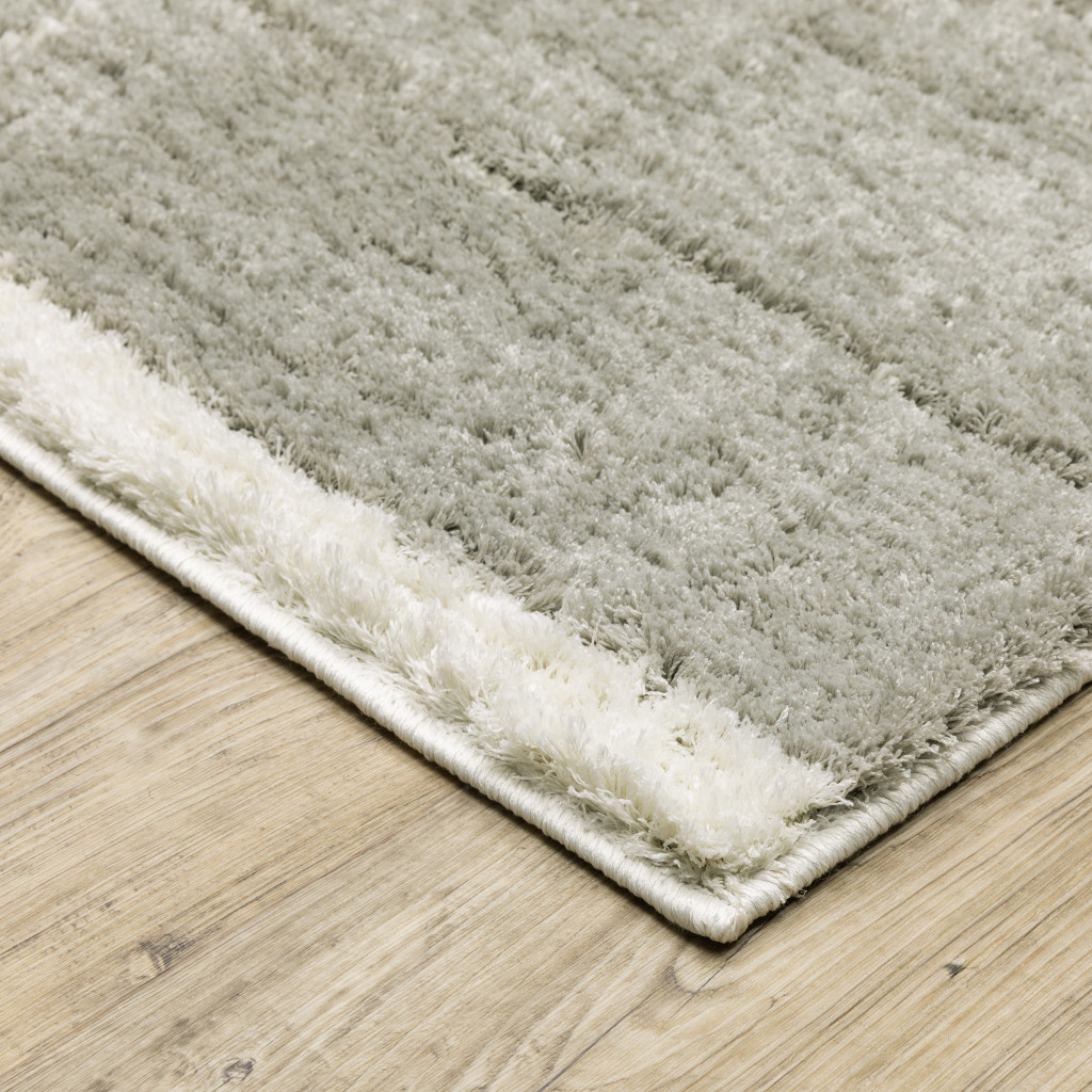 8" X 11" Gray and Ivory Geometric Shag Power Loom Area Rug