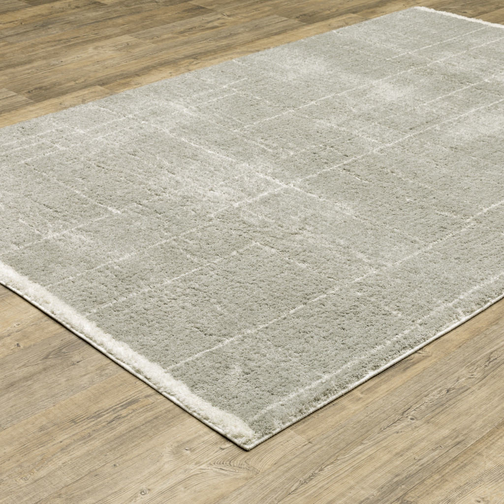 8" X 11" Gray and Ivory Geometric Shag Power Loom Area Rug
