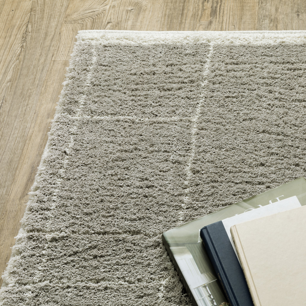 8" X 11" Gray and Ivory Geometric Shag Power Loom Area Rug