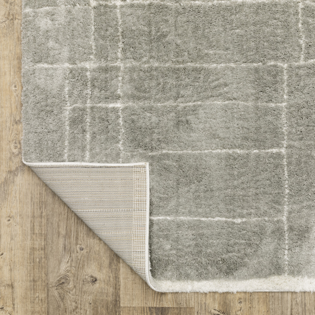 8" X 11" Gray and Ivory Geometric Shag Power Loom Area Rug