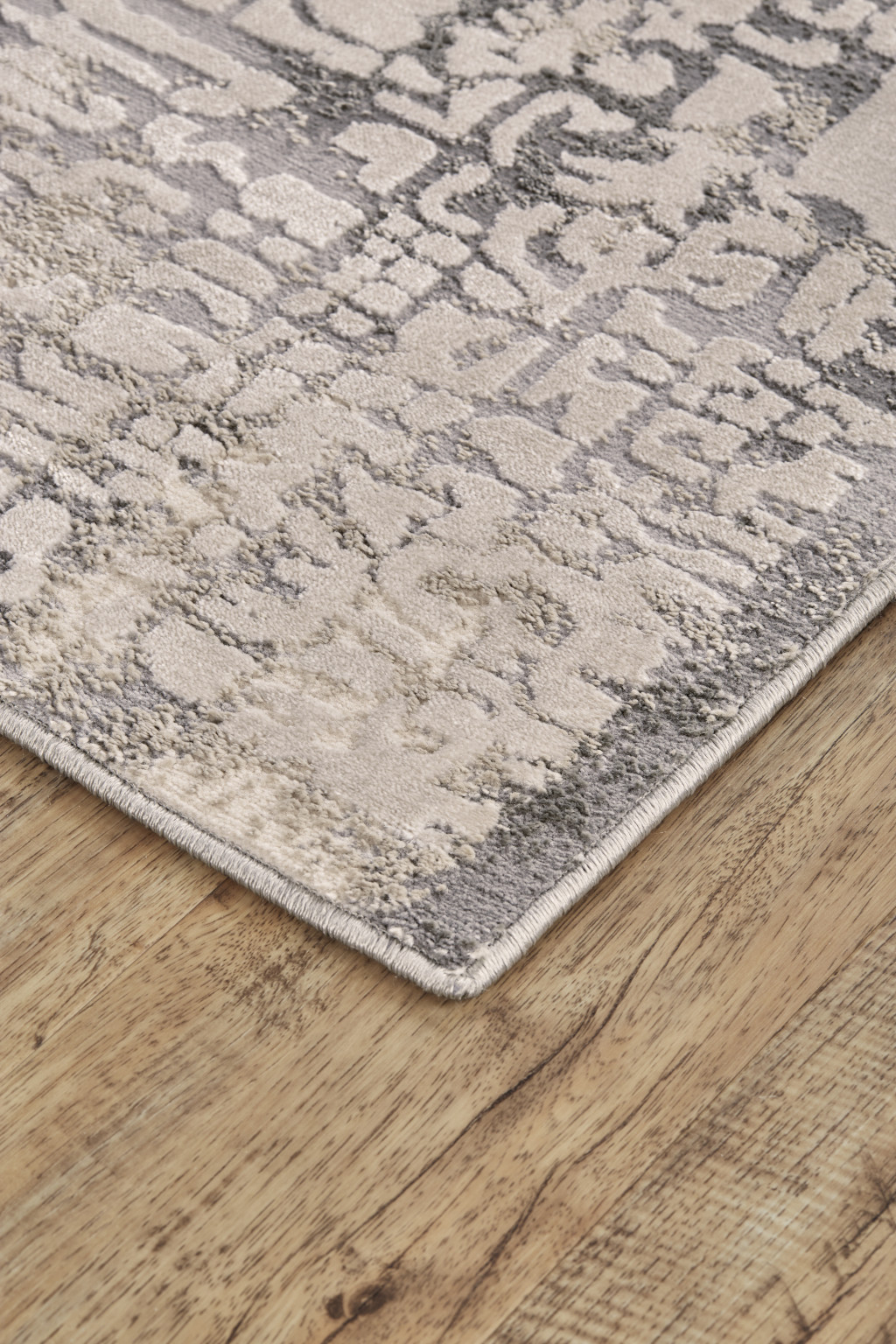 8" X 11" Gray and Ivory Abstract Area Rug