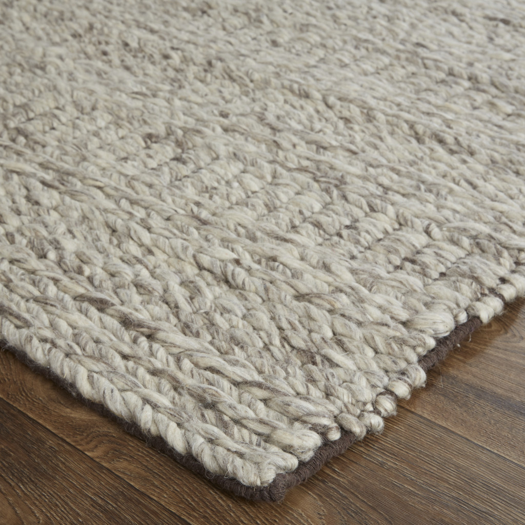5 X 8 Ivory gray And Tan Wool Hand Woven Stain Resistant Area Rug