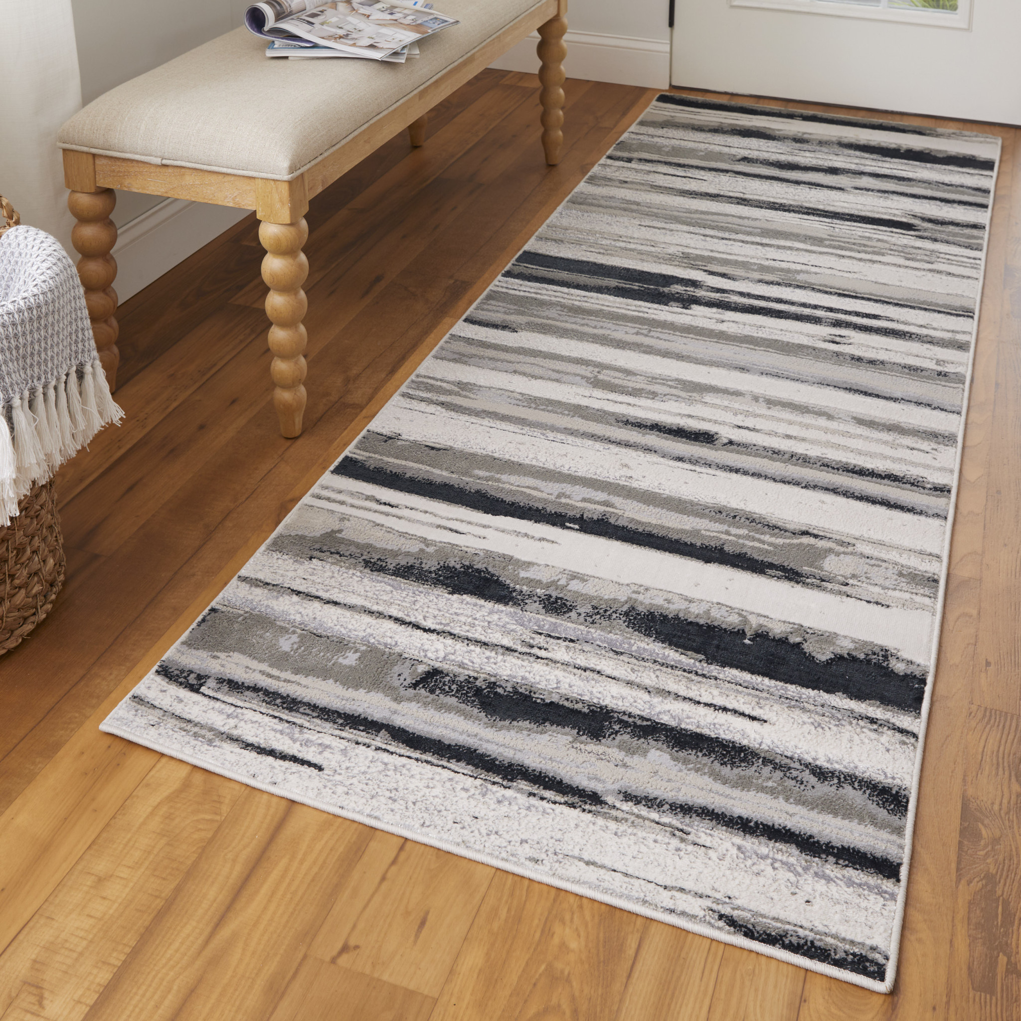 8" Beige and Black Abstract Distressed Runner Rug