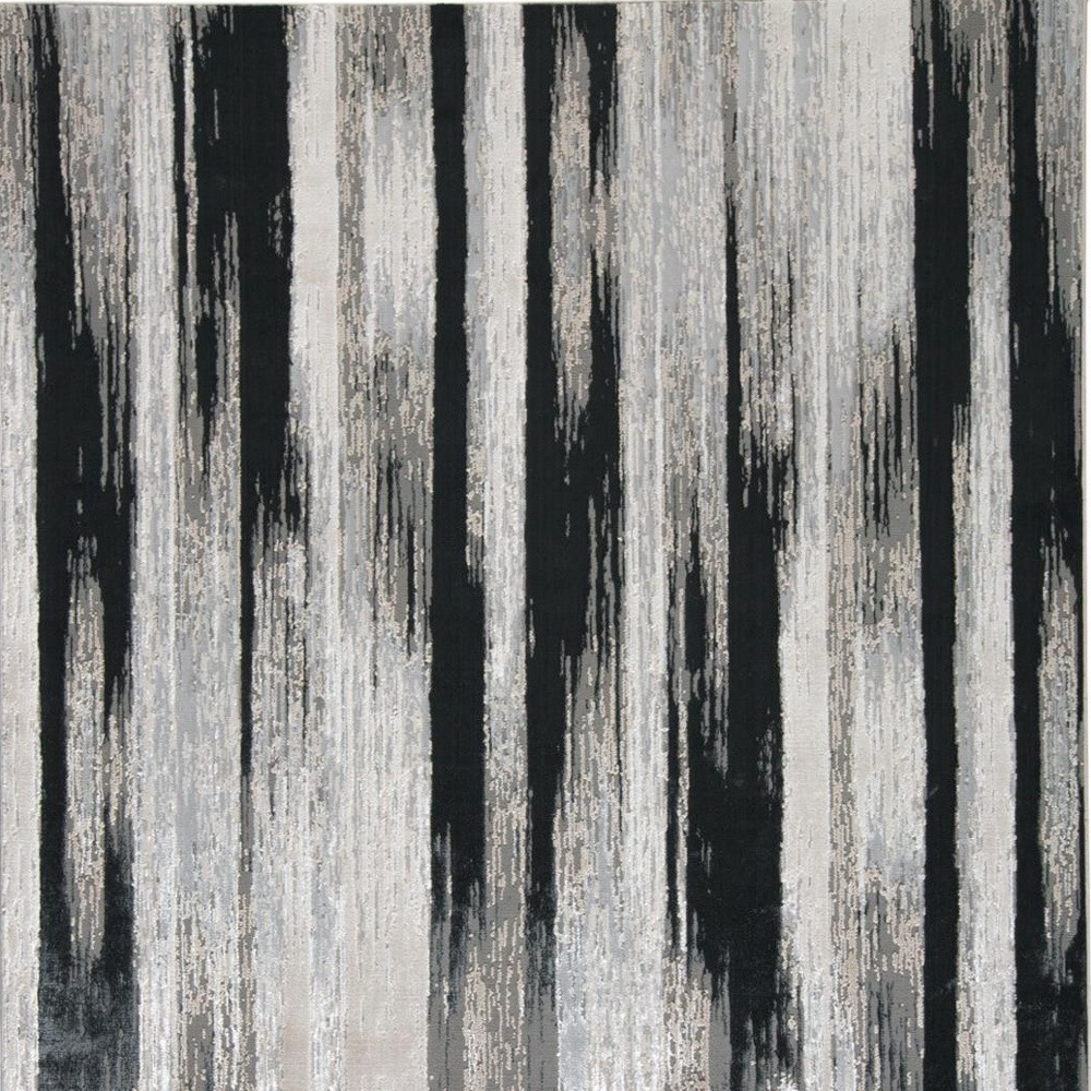 7" X 10" Black Silver and Gray Abstract Power Loom Area Rug