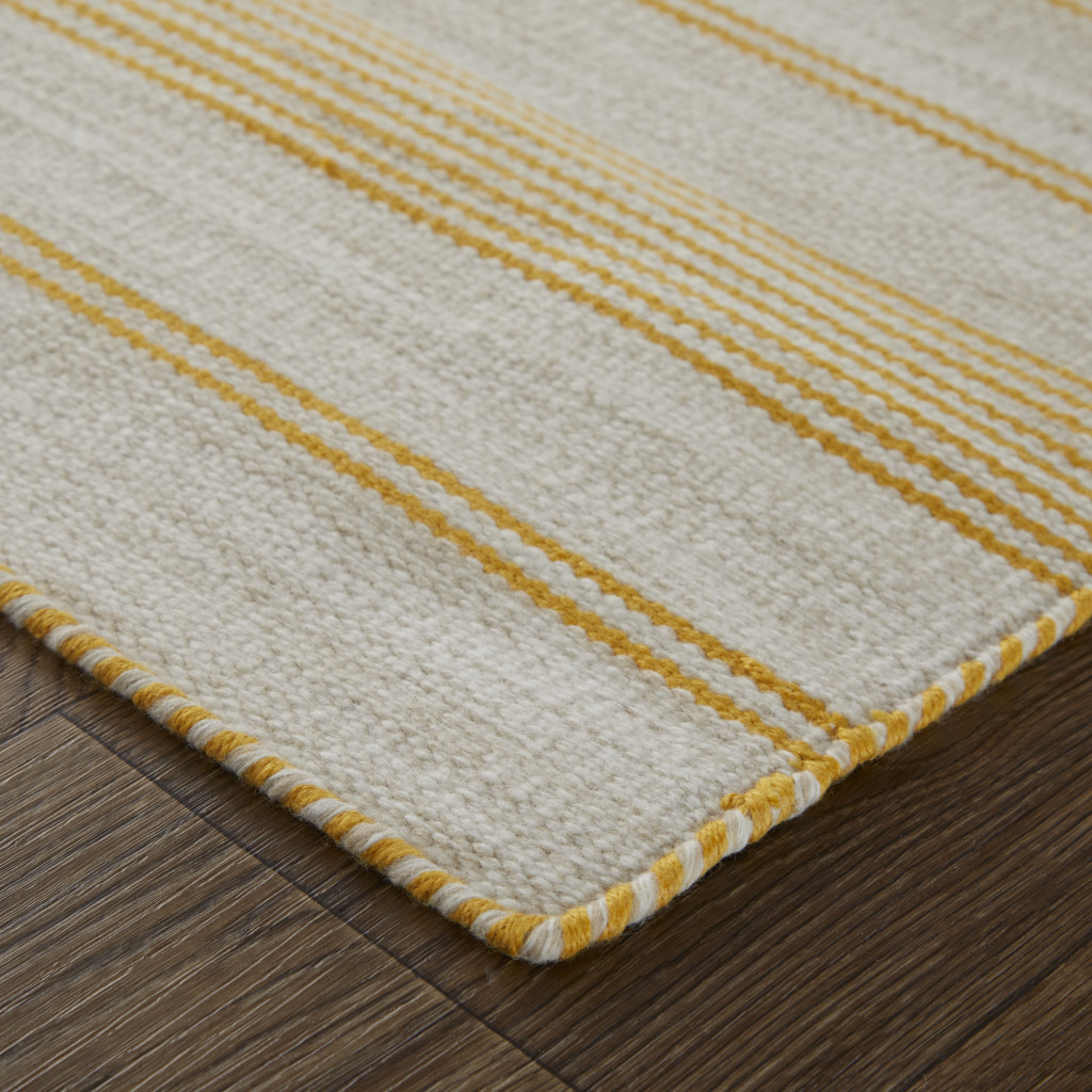 5" X 8" Yellow And Ivory Striped Dhurrie Hand Woven Stain Resistant Area Rug