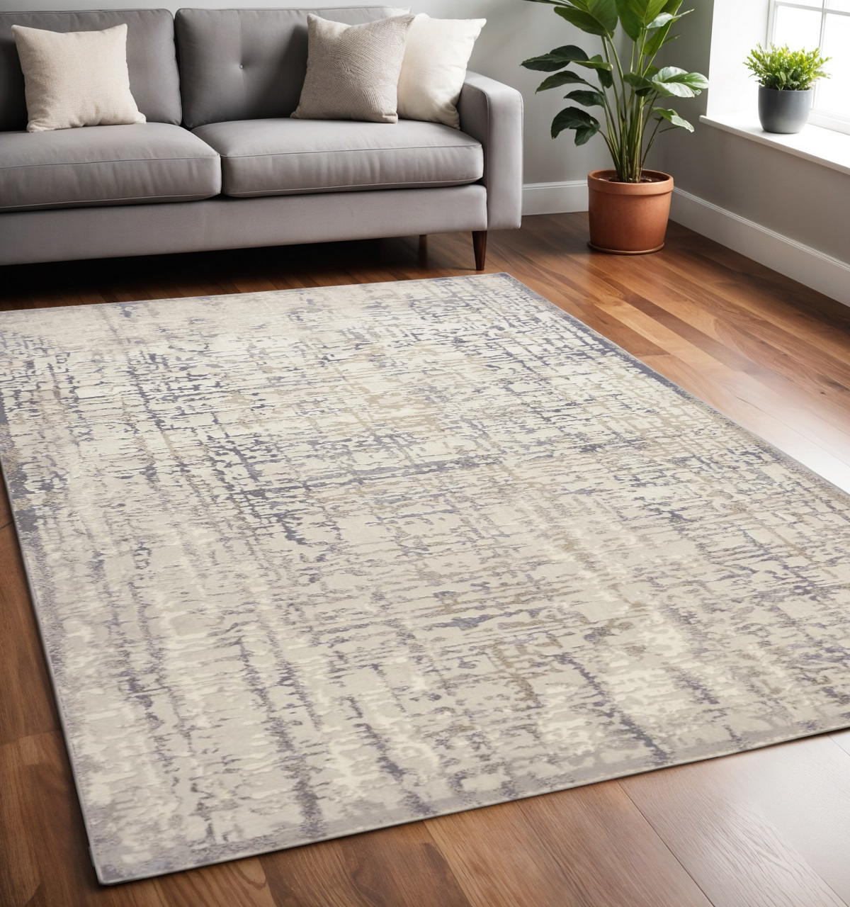 5" X 8" Gray and Ivory Abstract Area Rug