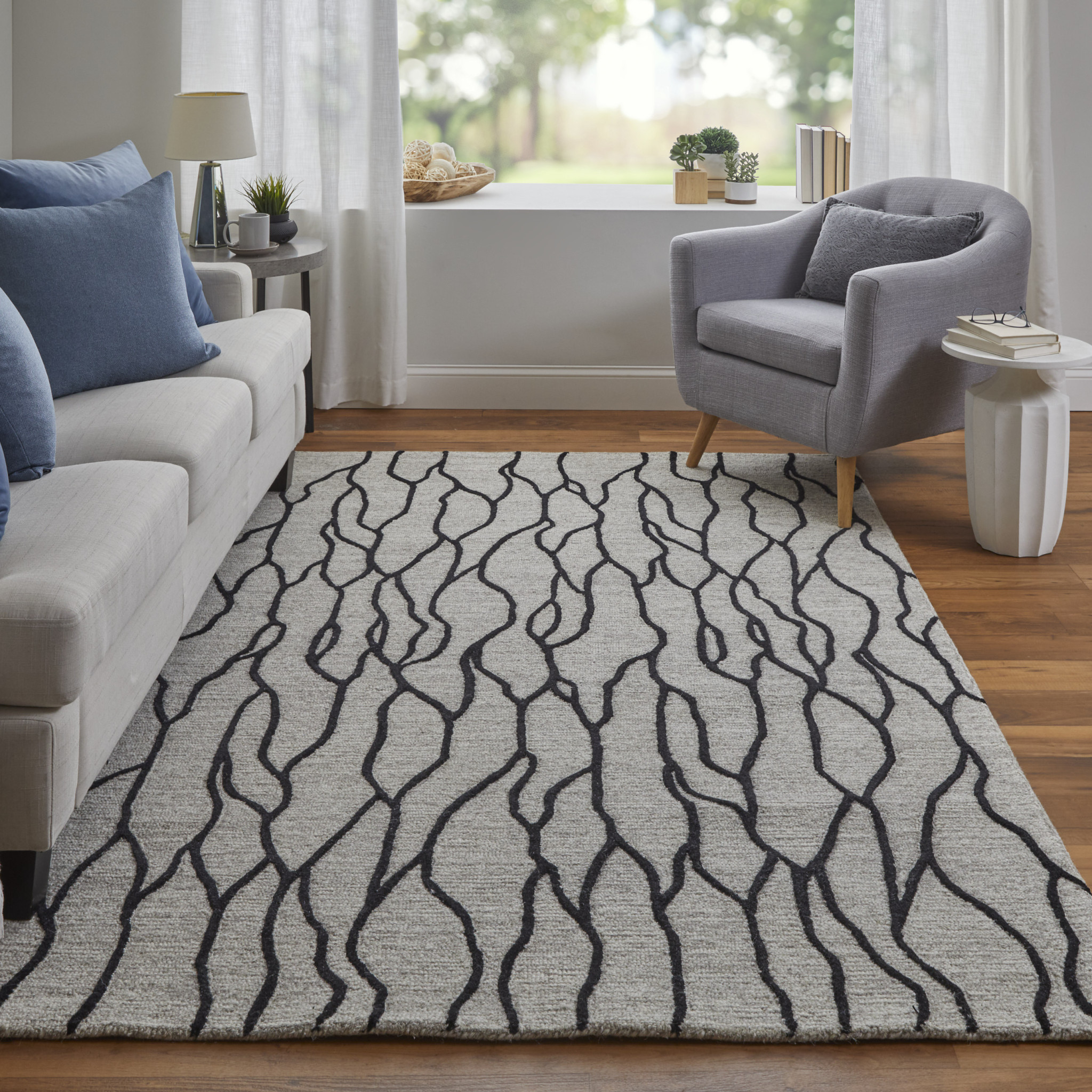 4" X 6" Taupe Black And Gray Wool Abstract Tufted Handmade Stain Resistant Area Rug