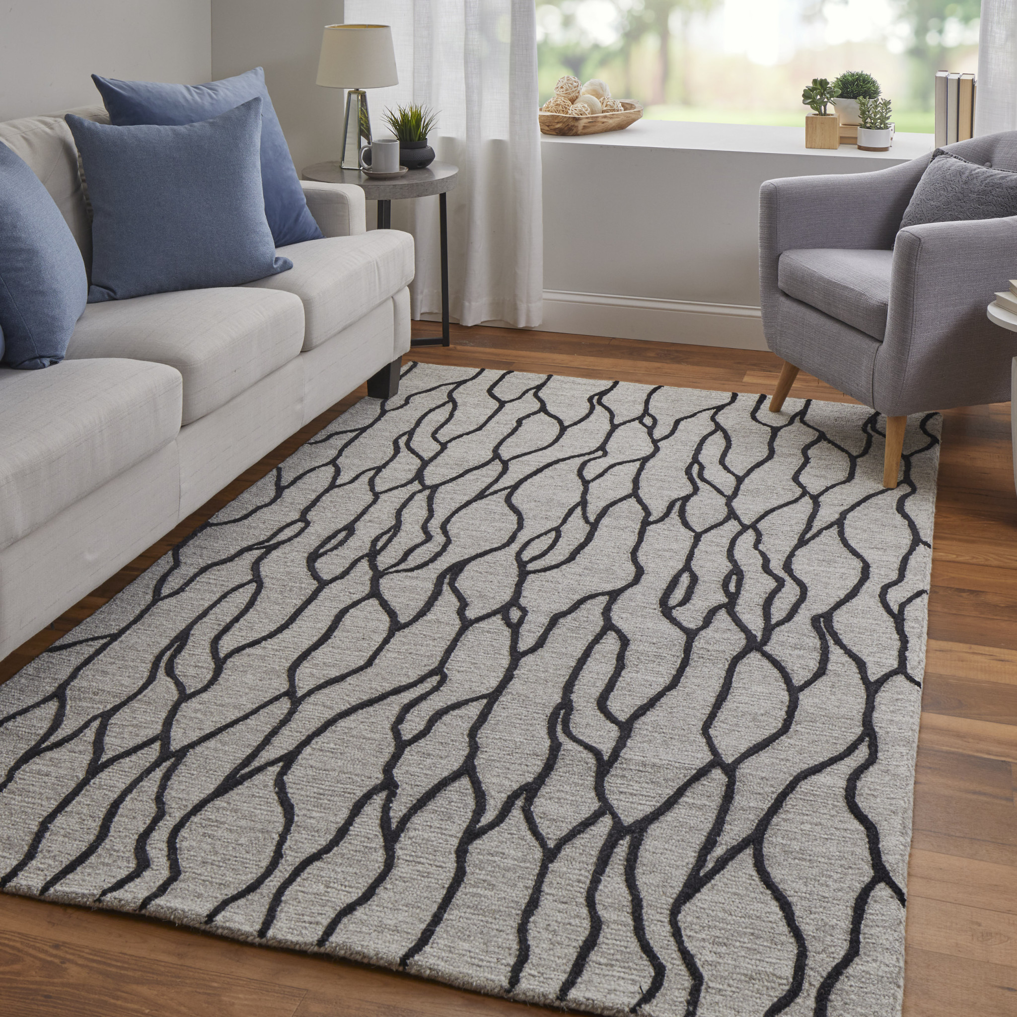 4" X 6" Taupe Black And Gray Wool Abstract Tufted Handmade Stain Resistant Area Rug