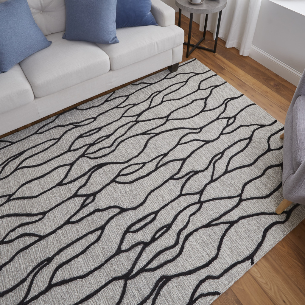 4" X 6" Taupe Black And Gray Wool Abstract Tufted Handmade Stain Resistant Area Rug