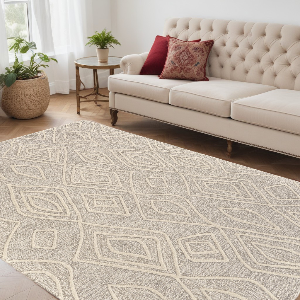 5" X 8" Tan And Ivory Wool Geometric Tufted Handmade Stain Resistant Area Rug