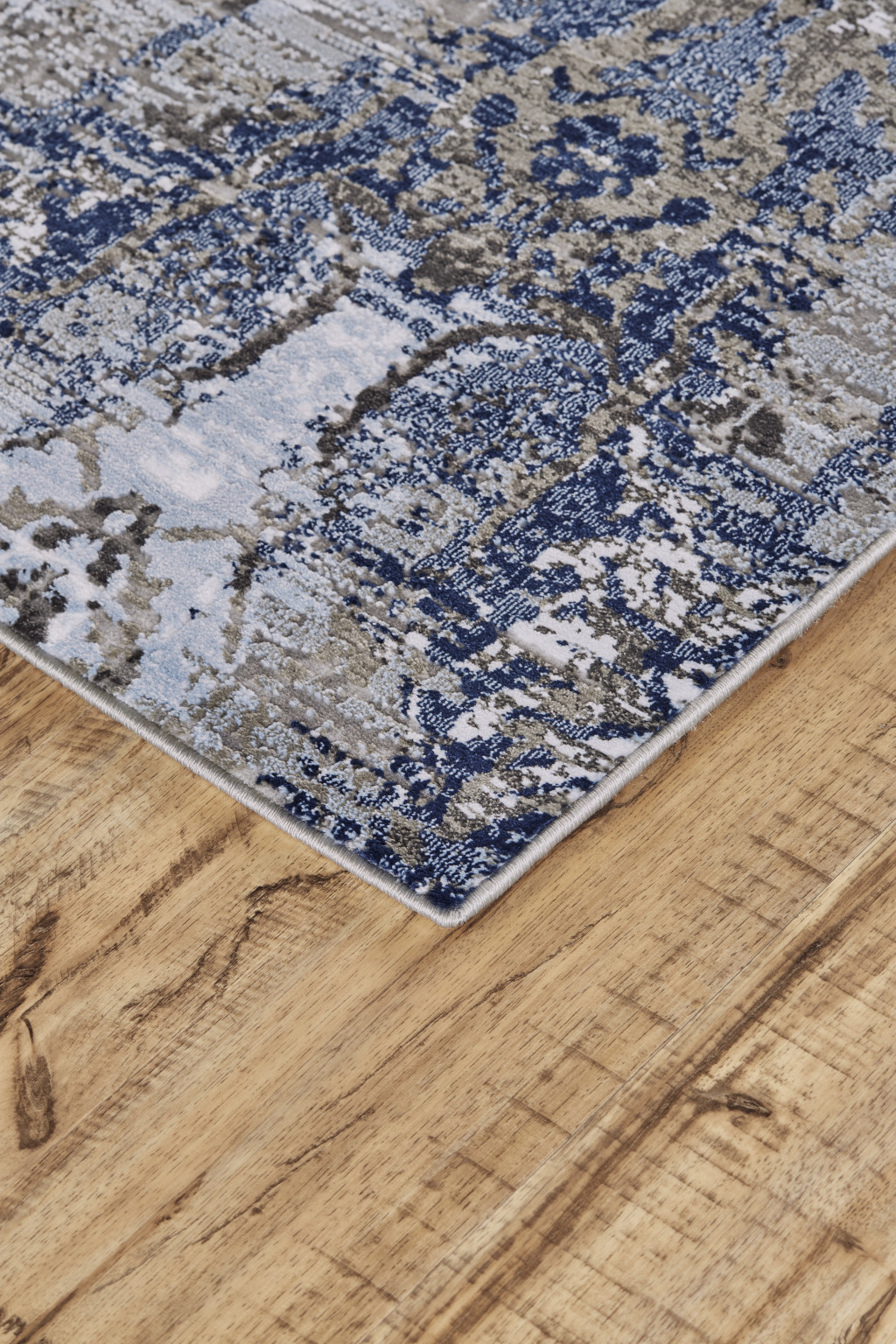 7" X 10" Gray and Ivory Abstract Non Skid Area Rug