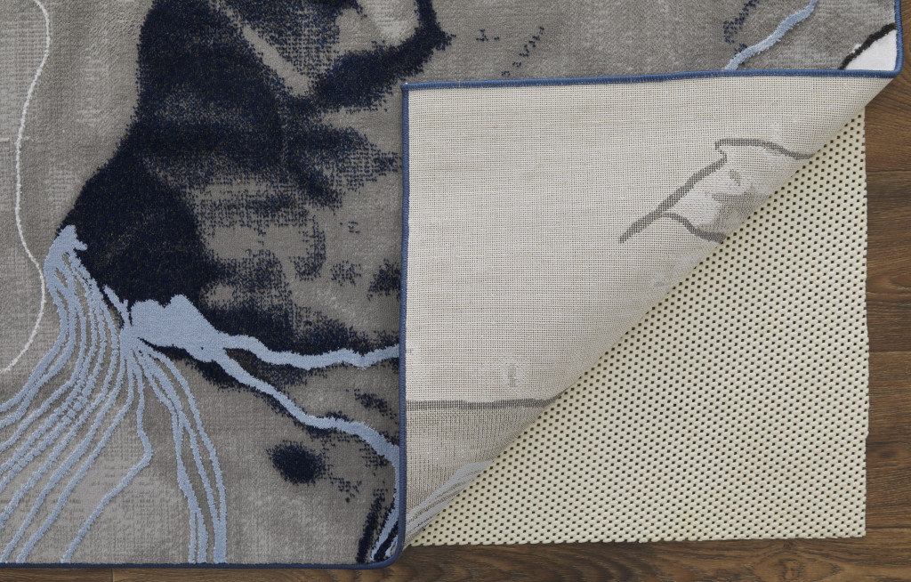 5" X 7" Blue Gray And Ivory Abstract Power Loom Stain Resistant Area Rug
