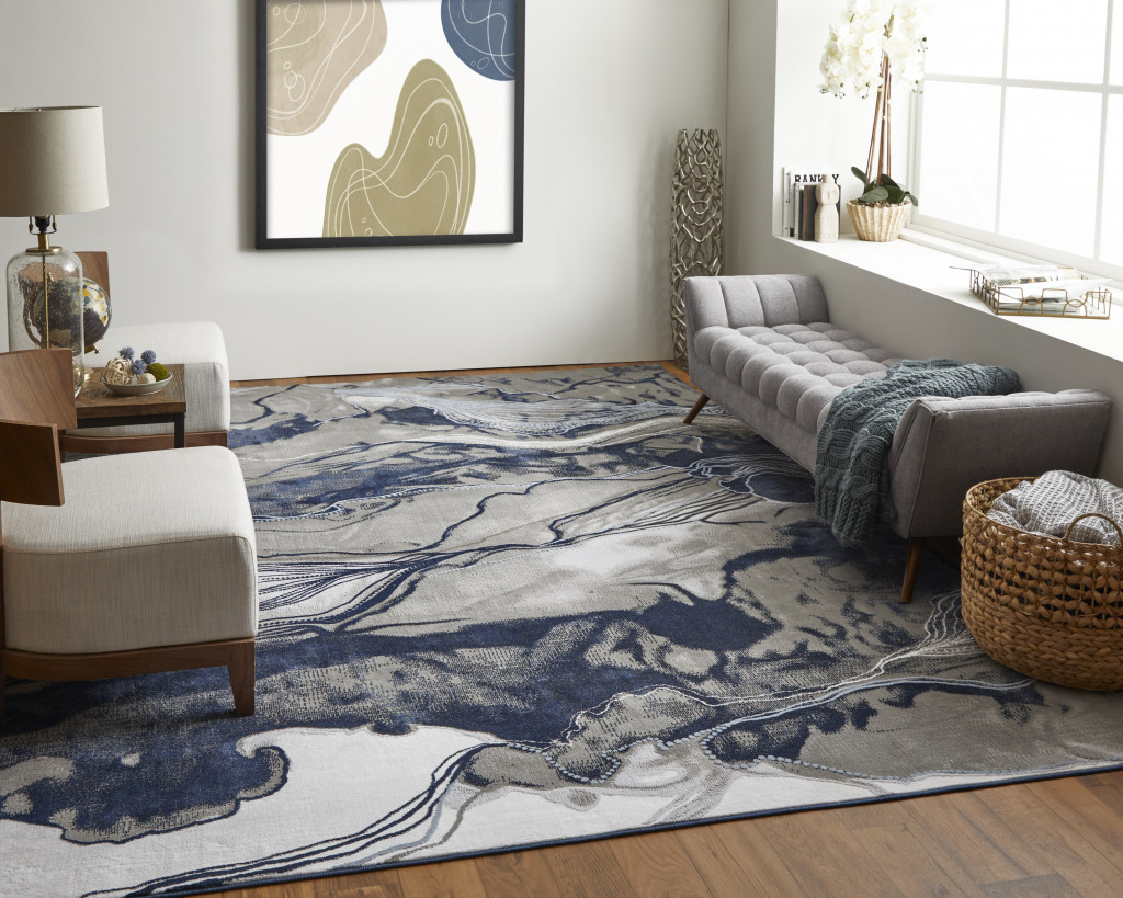 10" X 14" Blue Gray And Ivory Abstract Power Loom Stain Resistant Area Rug