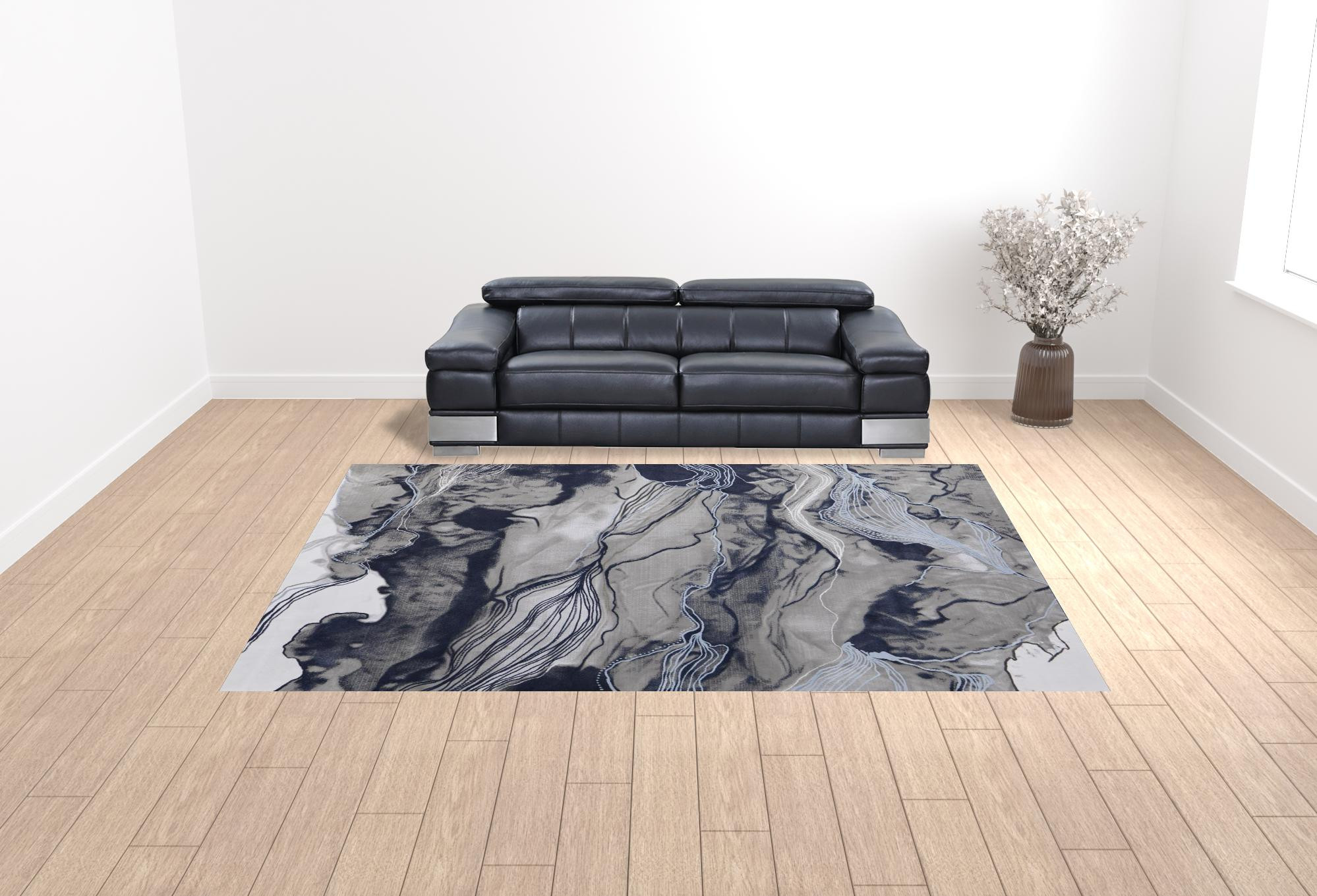 10" X 14" Blue Gray And Ivory Abstract Power Loom Stain Resistant Area Rug