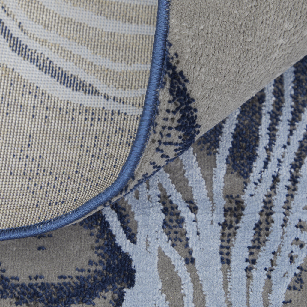 8" Blue Gray And Ivory Abstract Power Loom Runner Rug