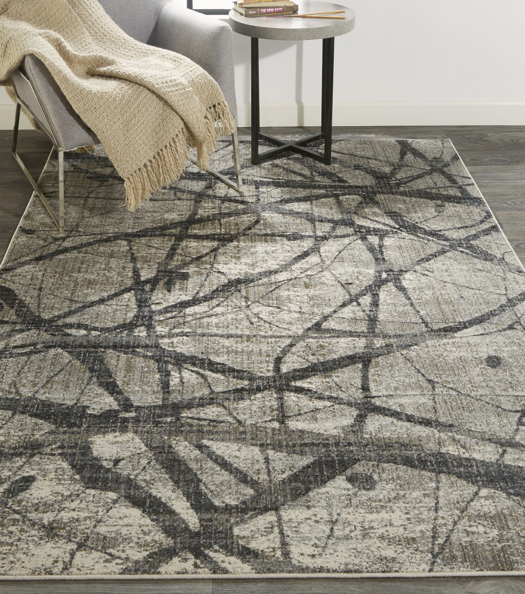 10" X 14" Taupe Gray And Ivory Abstract Stain Resistant Area Rug