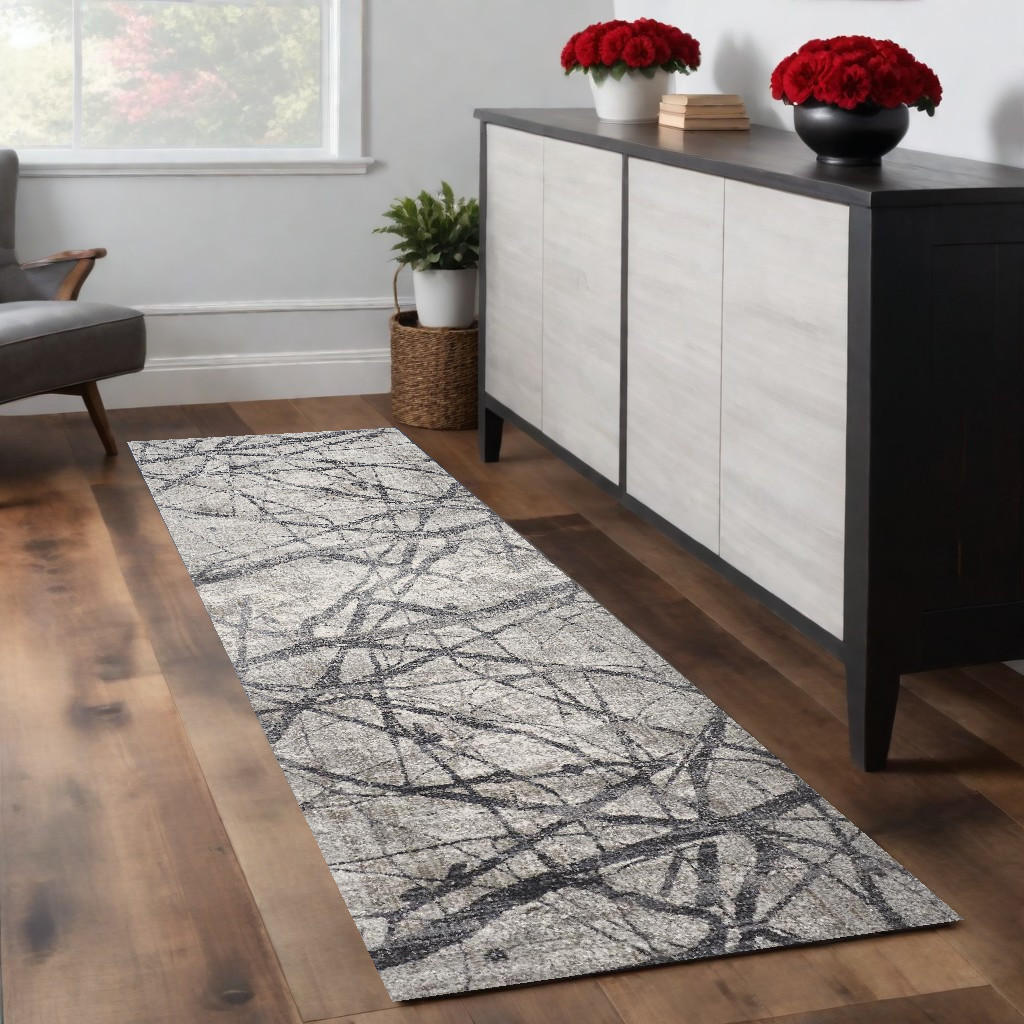 8" Gray and Ivory Abstract Power Loom Distressed Runner Rug