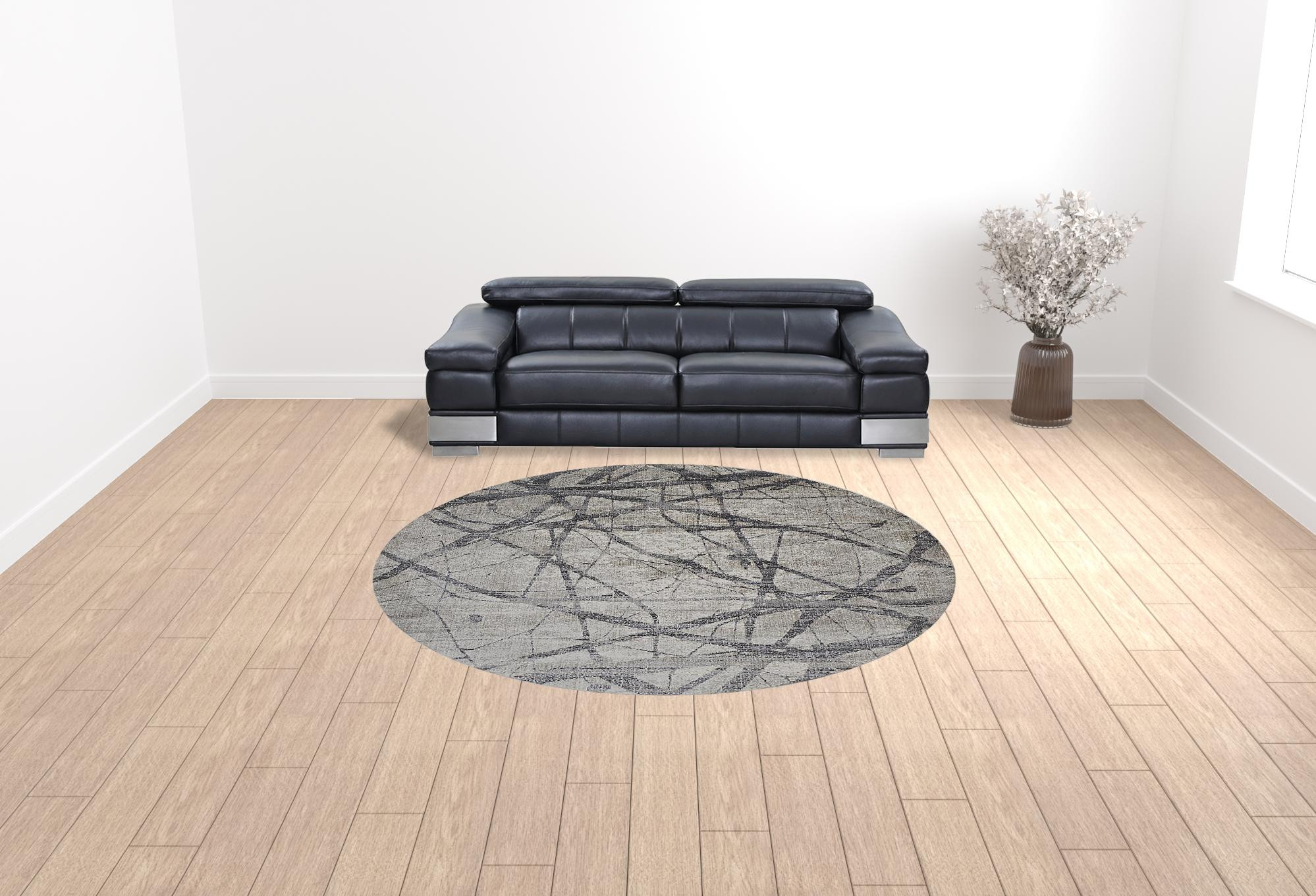 "9" Taupe Gray And Ivory Round Abstract Stain Resistant Area Rug
