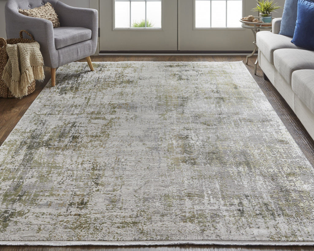 8" X 11" Green Gray And Ivory Abstract Area Rug With Fringe