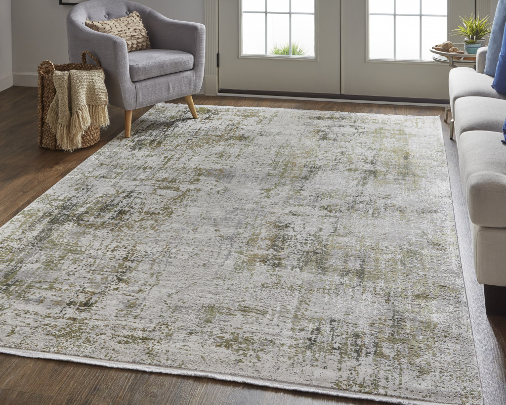 8" X 11" Green Gray And Ivory Abstract Area Rug With Fringe