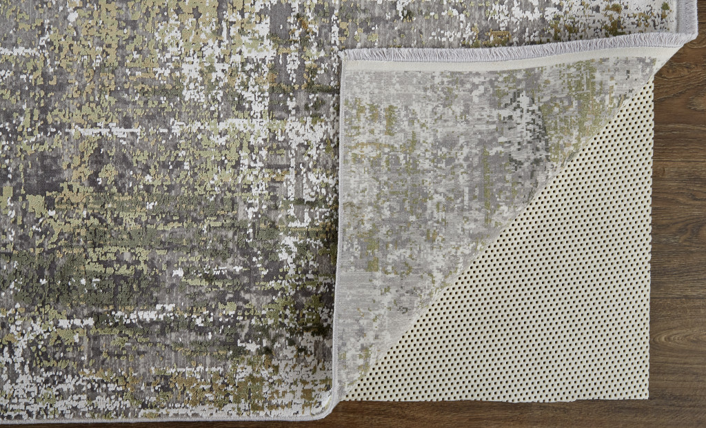 8" X 11" Green Gray And Ivory Abstract Area Rug With Fringe