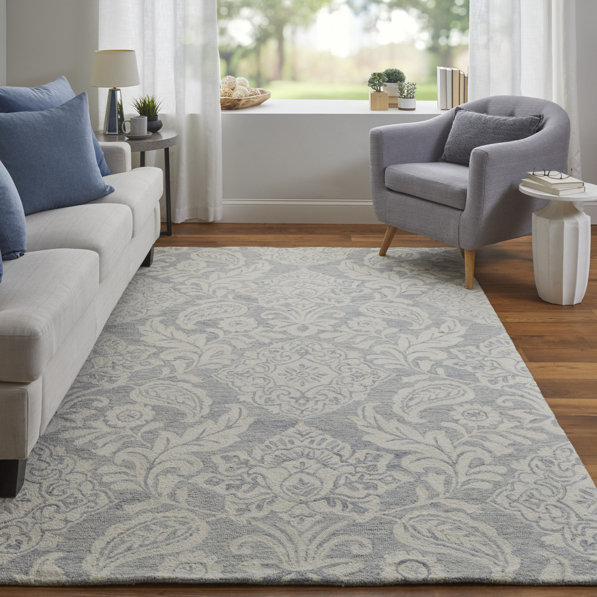 5 X 8 Blue And Ivory Wool Paisley Tufted Handmade Stain Resistant Area Rug