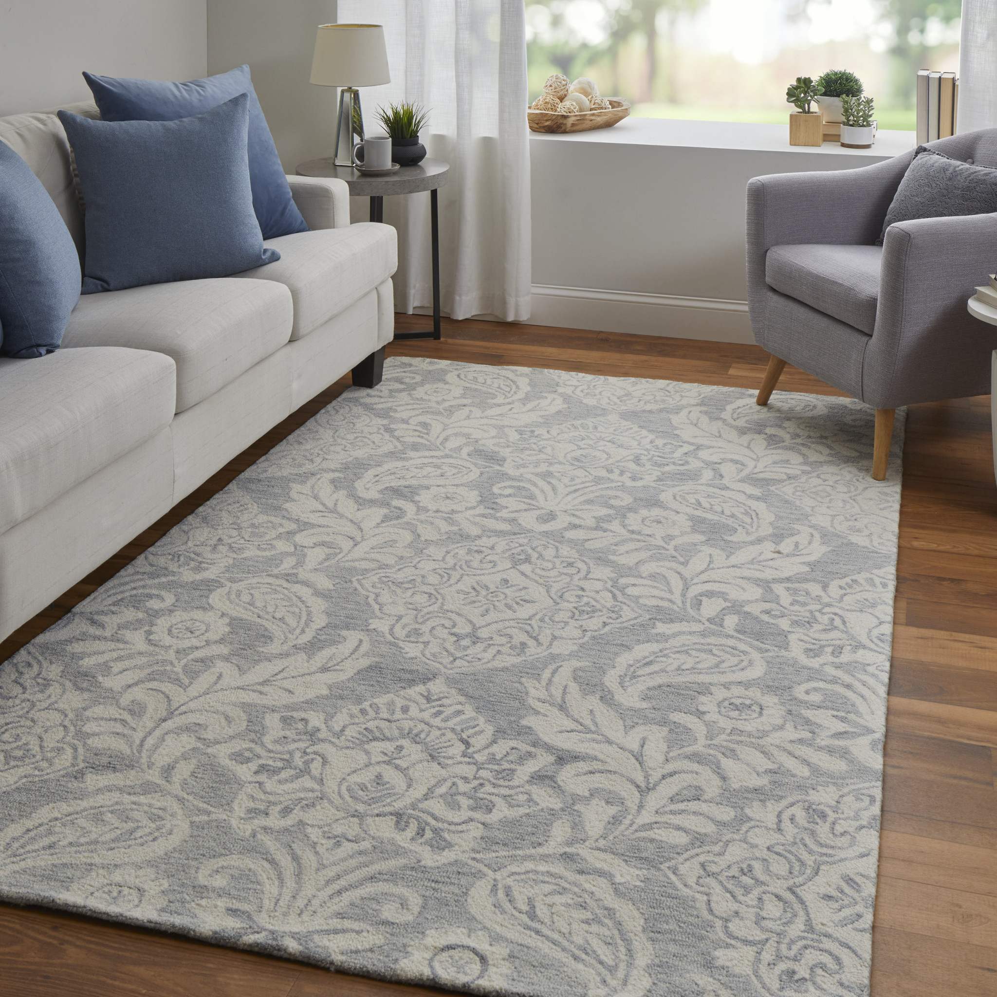 5 X 8 Blue And Ivory Wool Paisley Tufted Handmade Stain Resistant Area Rug