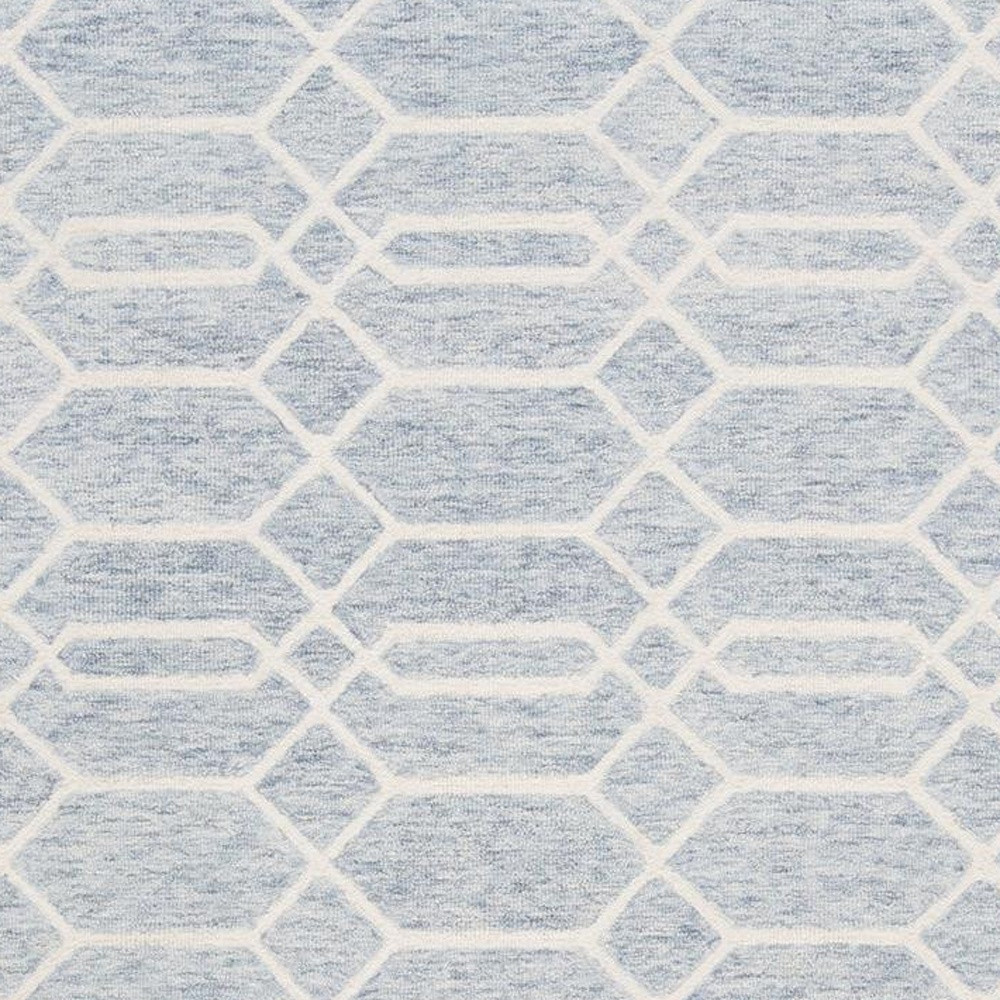 5" X 8" Blue And Ivory Wool Geometric Tufted Handmade Stain Resistant Area Rug