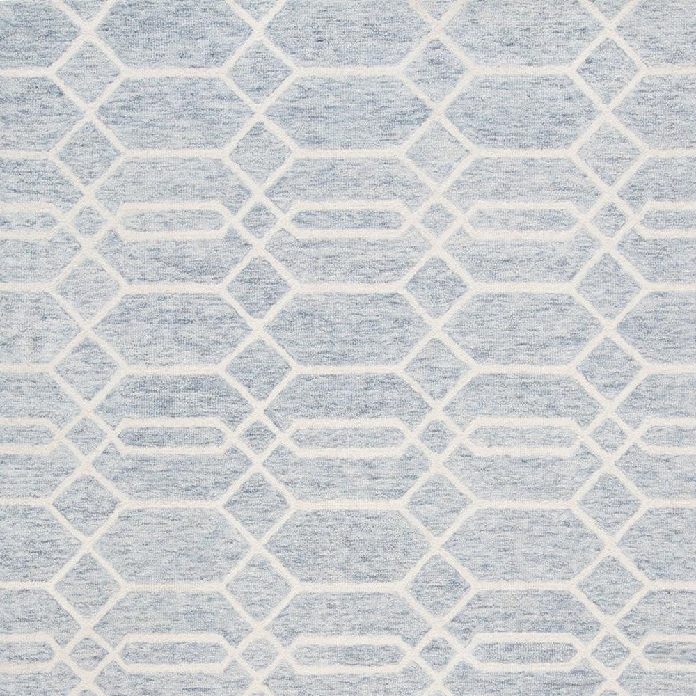 2" X 3" Blue And Ivory Wool Geometric Tufted Handmade Stain Resistant Area Rug