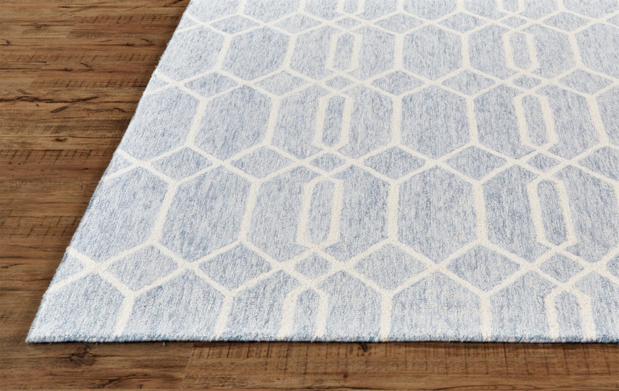 2" X 3" Blue And Ivory Wool Geometric Tufted Handmade Stain Resistant Area Rug