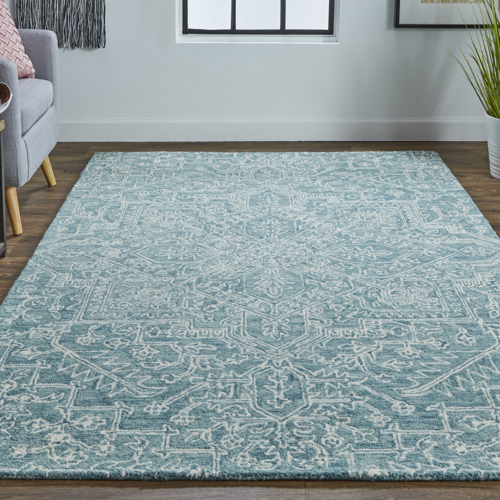 5" X 8" Blue Ivory And Green Wool Floral Tufted Handmade Stain Resistant Area Rug