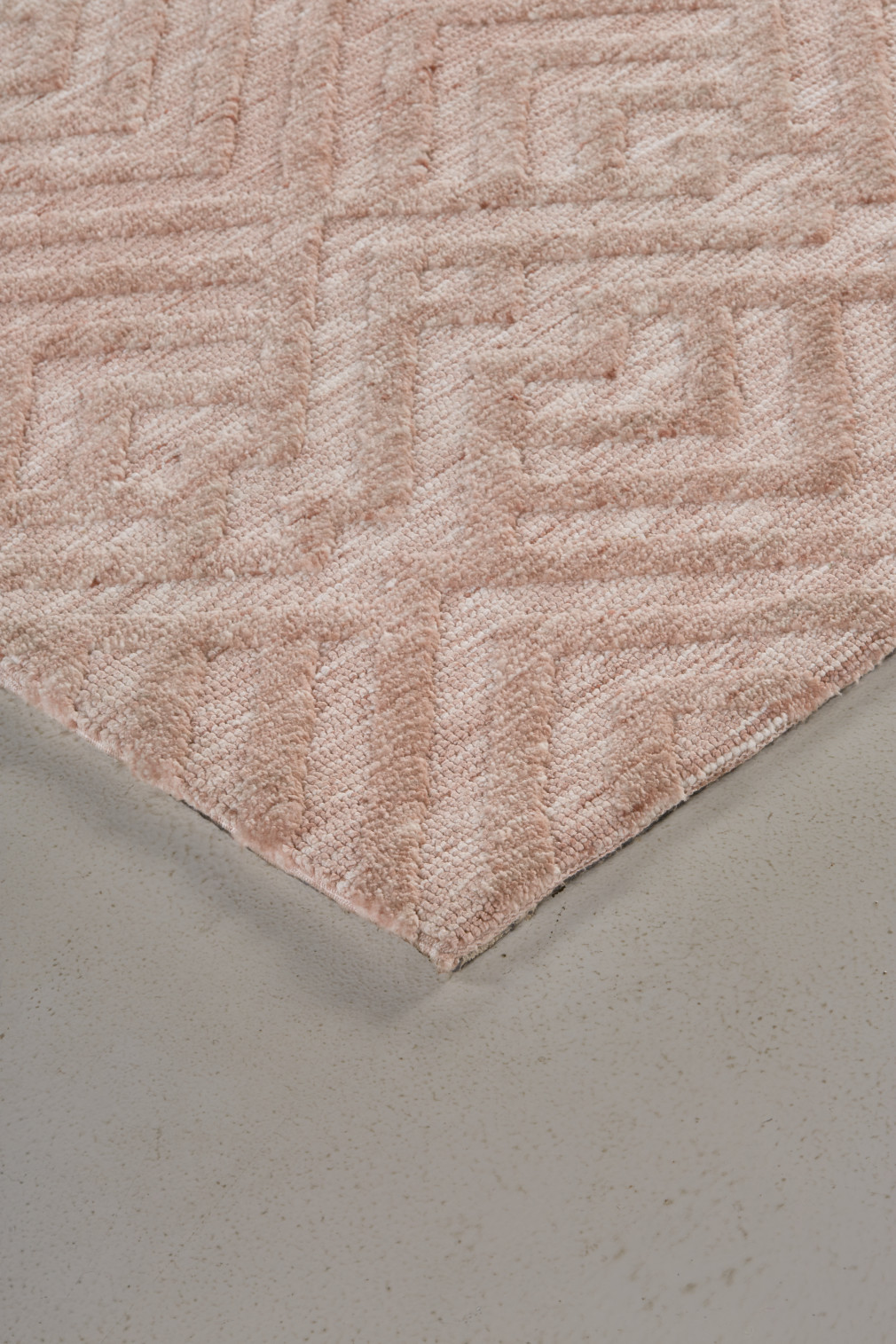 5 X 8 Pink And Ivory geometric Stain Resistant Area Rug