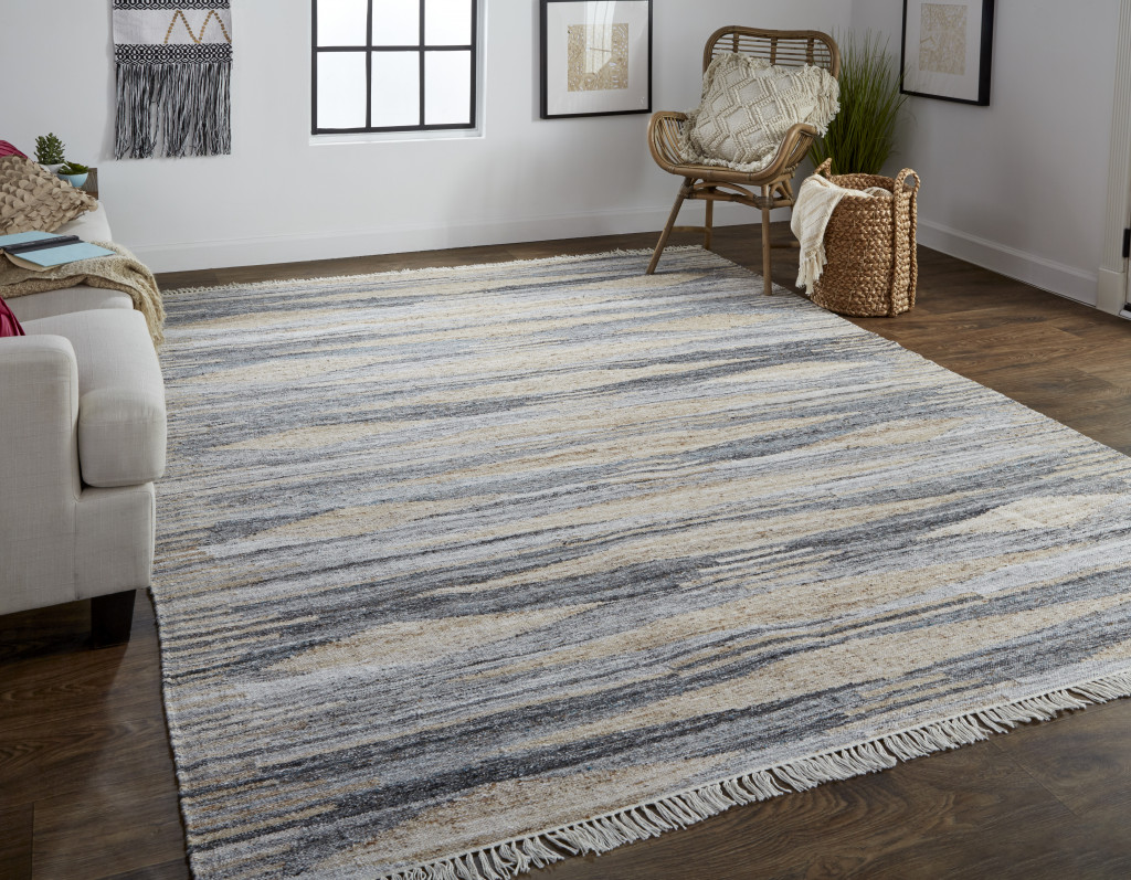 5" X 8" Gray and Ivory Abstract Hand Woven Area Rug With Fringe
