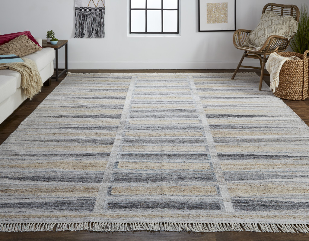 5" X 8" Tan Gray And Taupe Geometric Hand Woven Stain Resistant Area Rug With Fringe