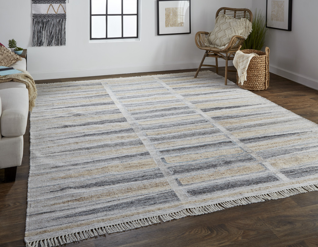 5" X 8" Tan Gray And Taupe Geometric Hand Woven Stain Resistant Area Rug With Fringe