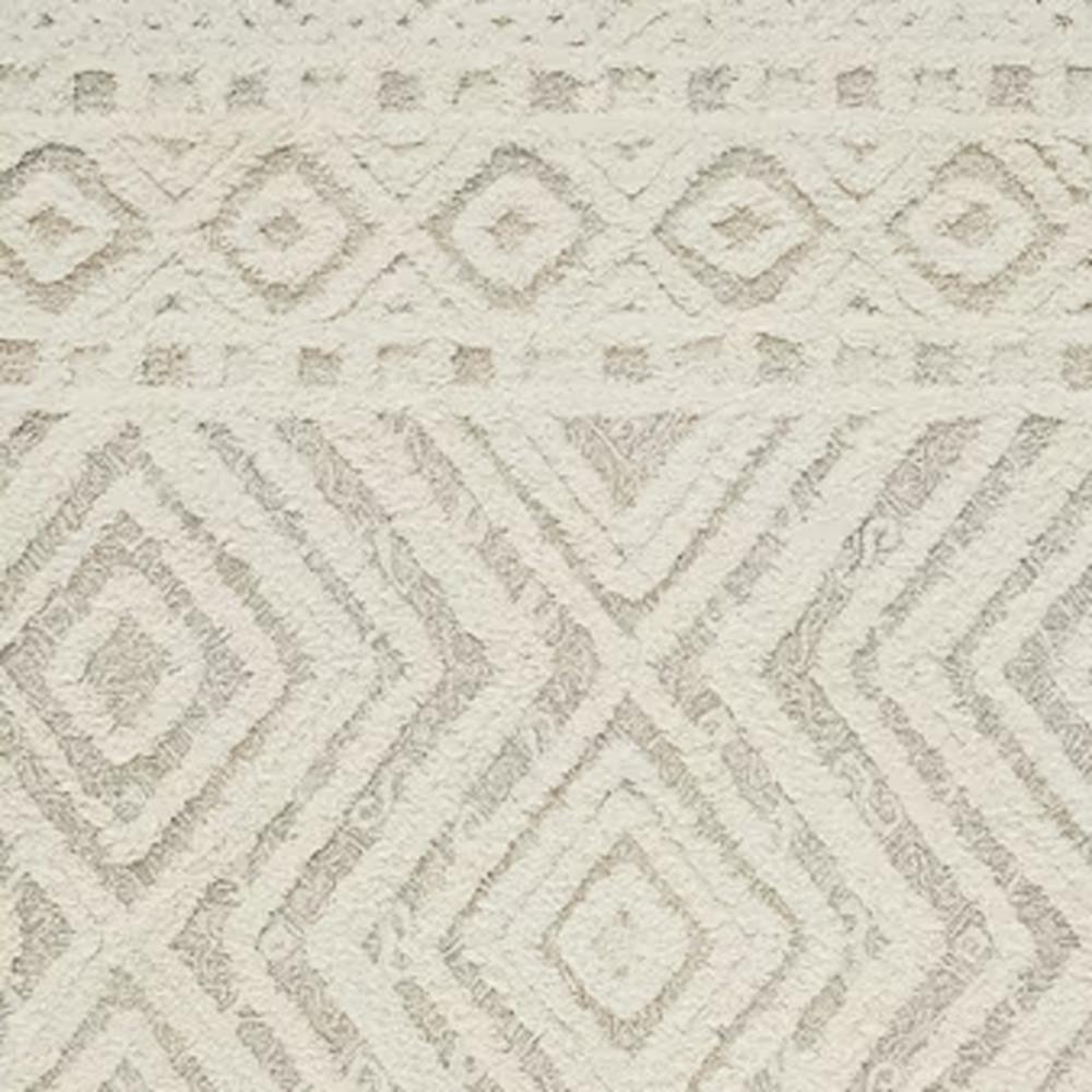 5" X 8" Ivory And Tan Wool Geometric Tufted Handmade Stain Resistant Area Rug