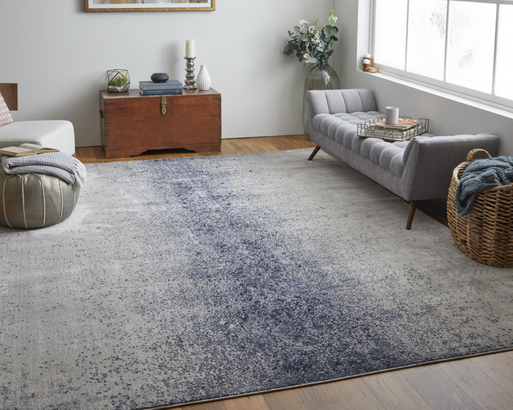 5" X 8" Ivory and Blue Abstract Power Loom Non Skid Area Rug