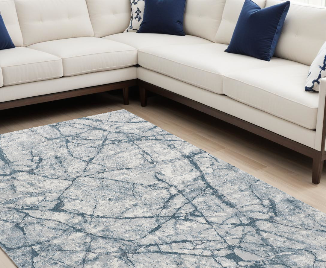 8" X 10" Blue Gray And Ivory Abstract Distressed Stain Resistant Area Rug