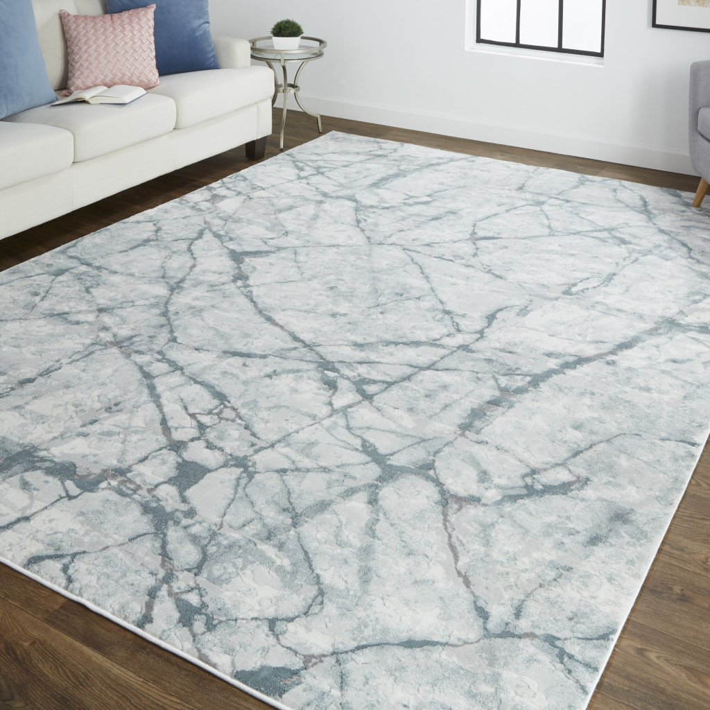 8" X 10" Blue Gray And Ivory Abstract Distressed Stain Resistant Area Rug