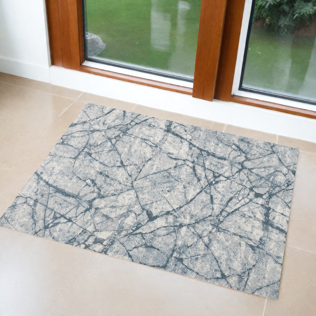 2" X 3" Blue Gray And Ivory Abstract Distressed Stain Resistant Area Rug