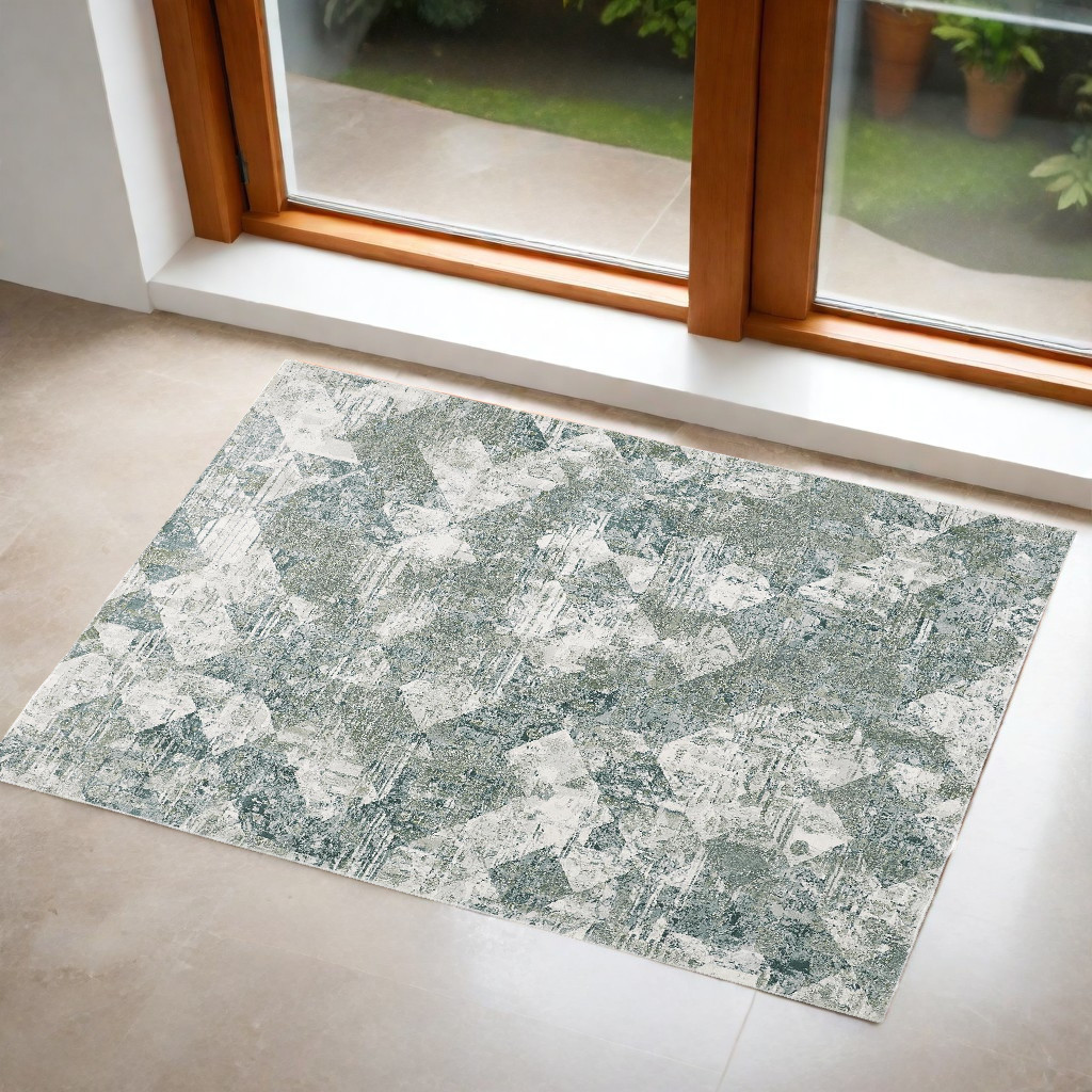 3" X 5" Green And Ivory Patchwork Distressed Stain Resistant Area Rug