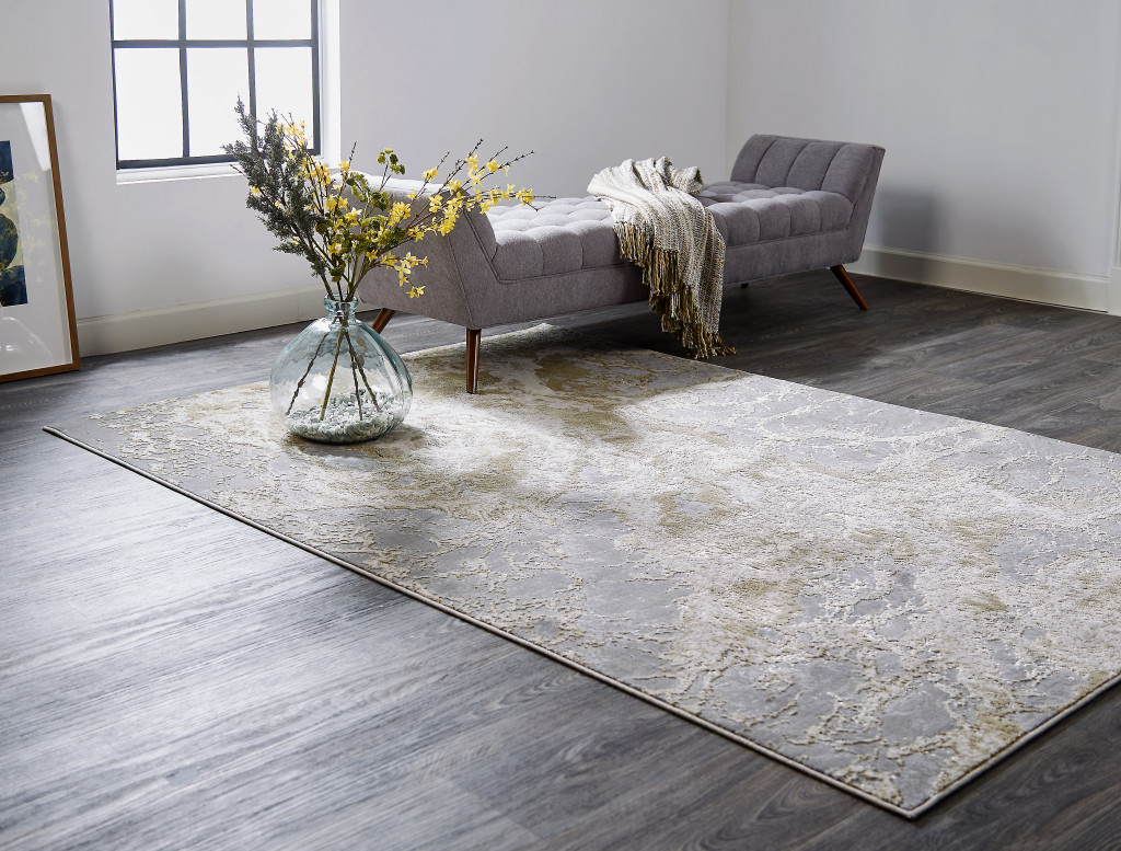 10" X 13" Ivory Silver And Gold Abstract Stain Resistant Area Rug