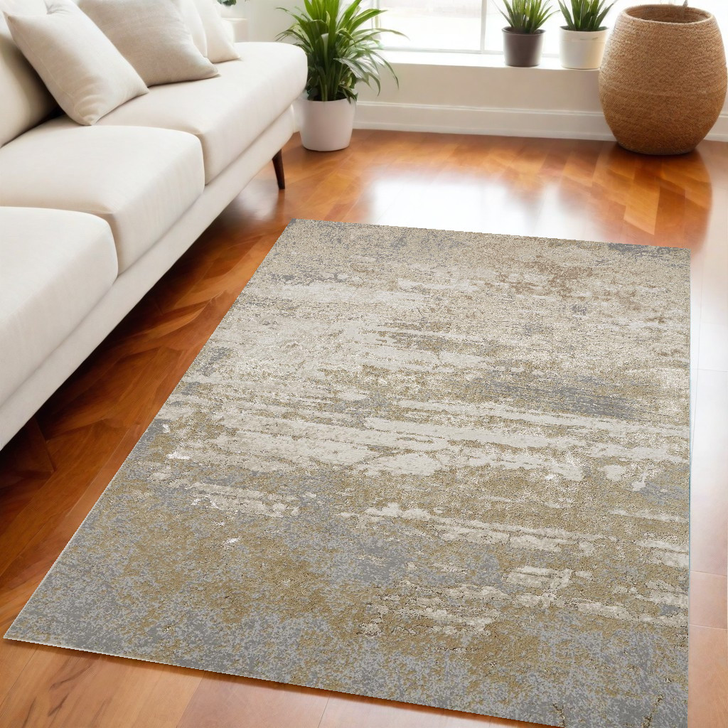 5" X 8" Ivory Gold And Gray Abstract Stain Resistant Area Rug