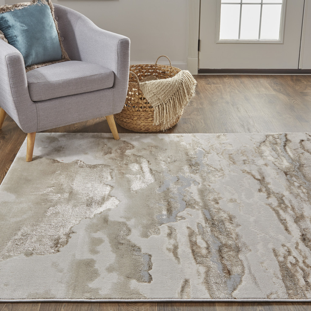 9" X 12" Ivory Tan And Gray Abstract Area Rug