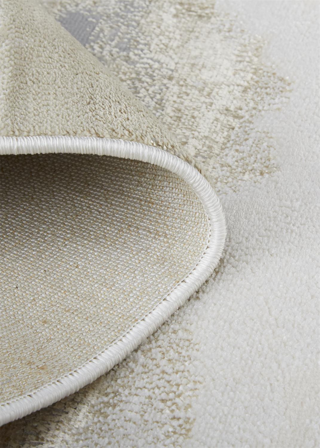 9" X 12" Ivory Tan And Gray Abstract Area Rug