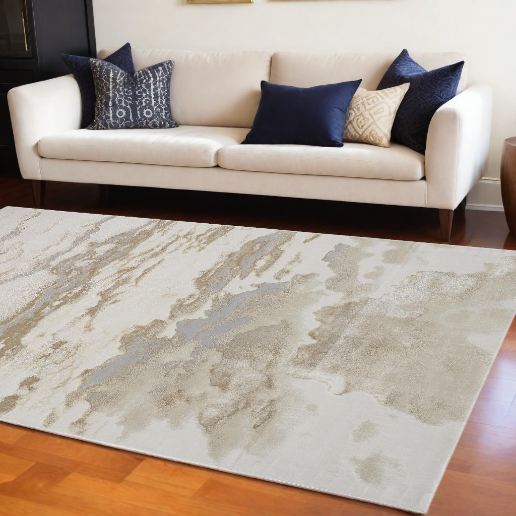 10" X 13" Ivory Tan And Gray Abstract Stain Resistant Area Rug