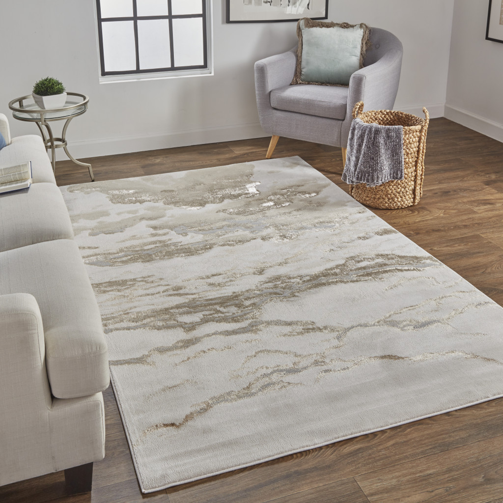 10" X 13" Ivory Tan And Gray Abstract Stain Resistant Area Rug