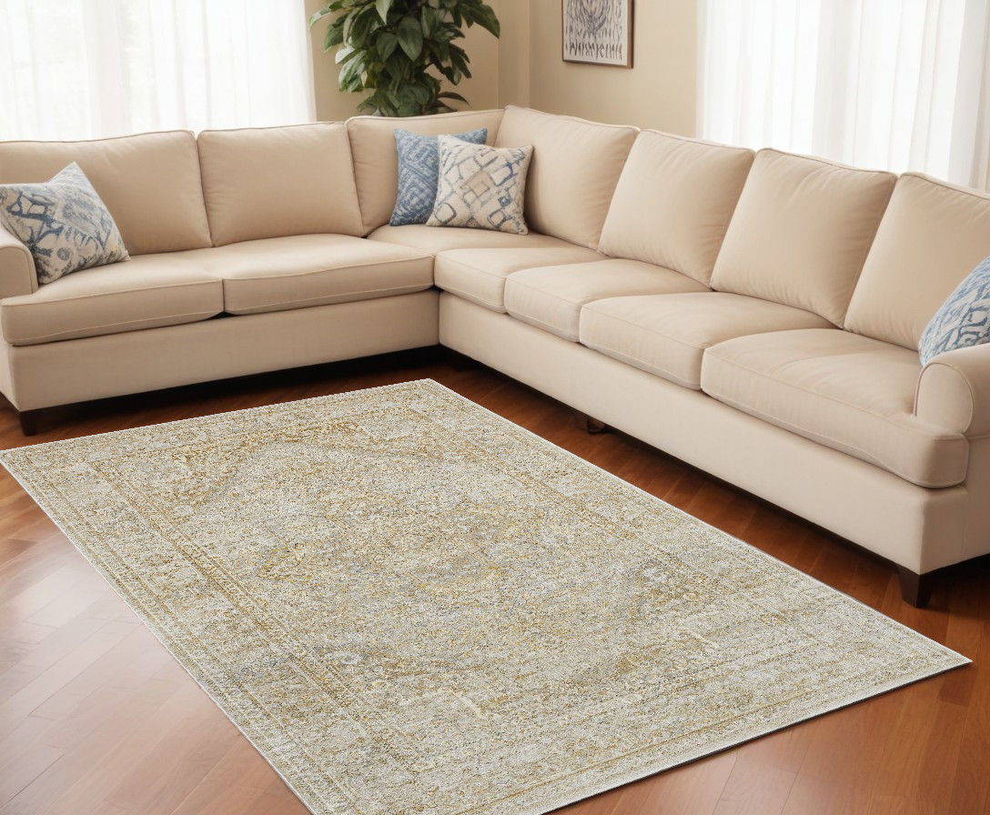10" X 13" Ivory And Gold Floral Stain Resistant Area Rug