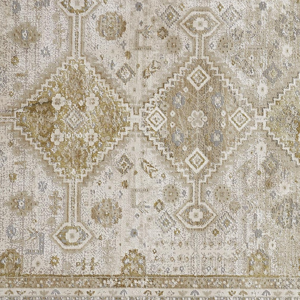 5" X 8" Gold And Ivory Floral Stain Resistant Area Rug